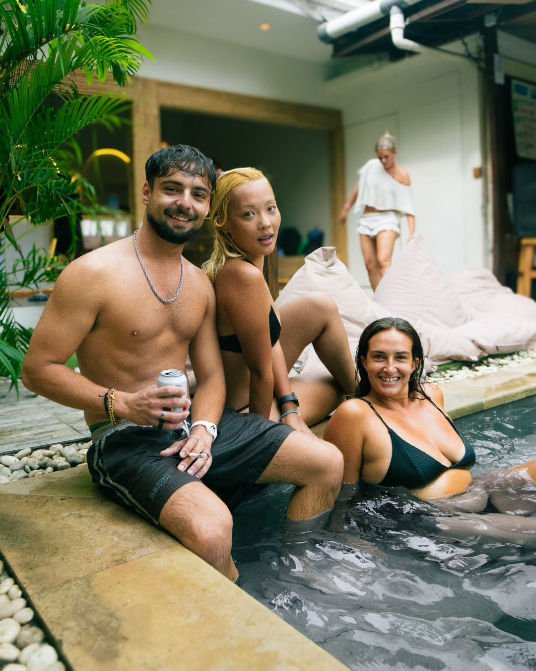 Guests hanging out at the M Box pool